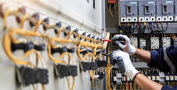 Professional Electrician technician working in Helena, OK